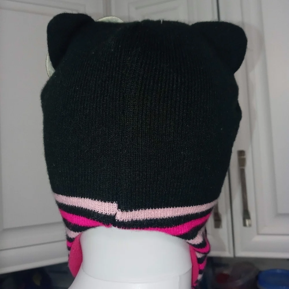 Hello Kitty girl knit beanie ear flap cap w Embroidered face and braided tassels